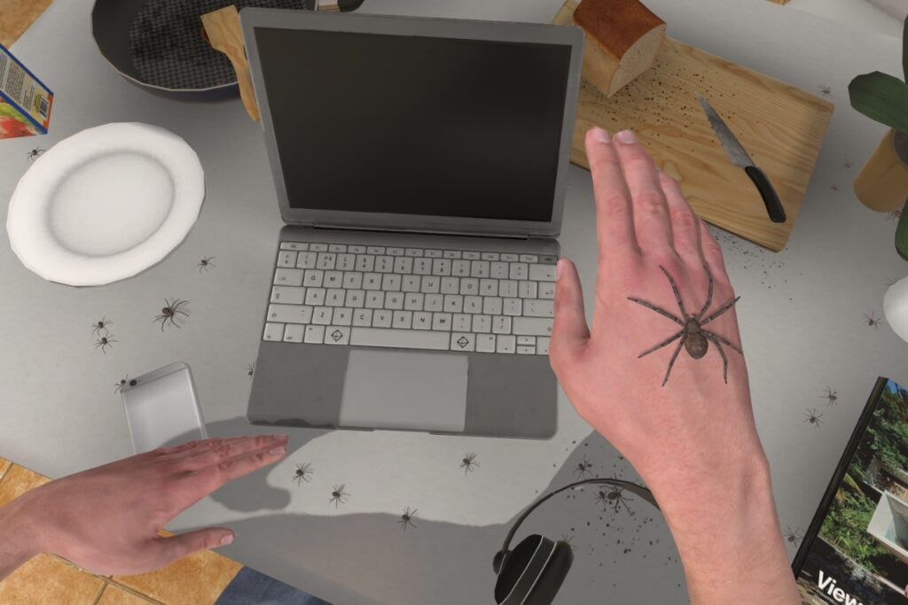 Araignée sur une main dans une simulation virtuelle